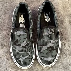 Never worn boys slip on Vans sneakers